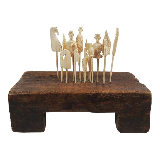 19th Century Carved Bone Game Pieces Collection With Wood Stand For Sale