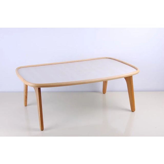 Beautiful bedside serving table, also known as a folding tray. Made of wood, with very light gray formica top and plastic...