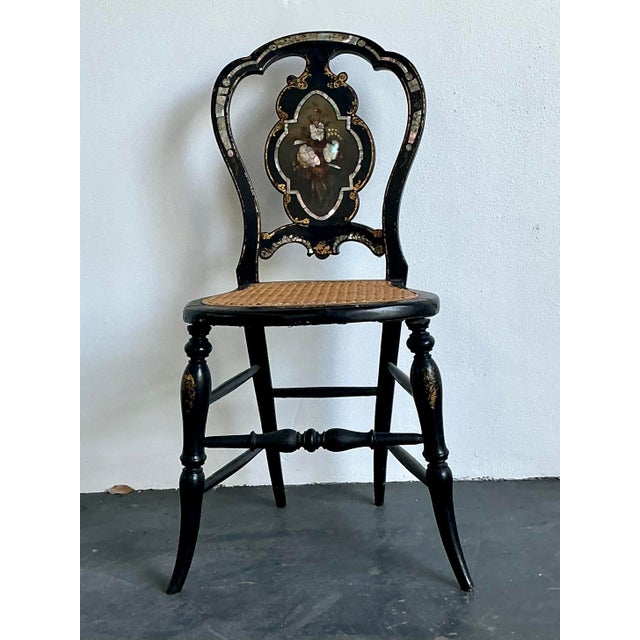 This exquisite antique Victorian side chair is a masterclass in 19th-century decorative artistry. Featuring a stately...