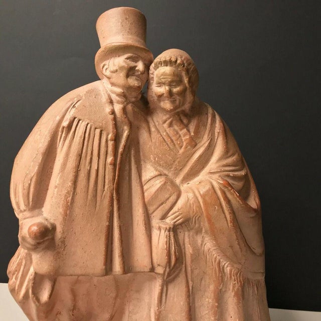 Norman Couple Figurine in Terracotta from V. Becquerel, 1800s, in Very Good conditions. Designed 1920 to 1949 This piece...