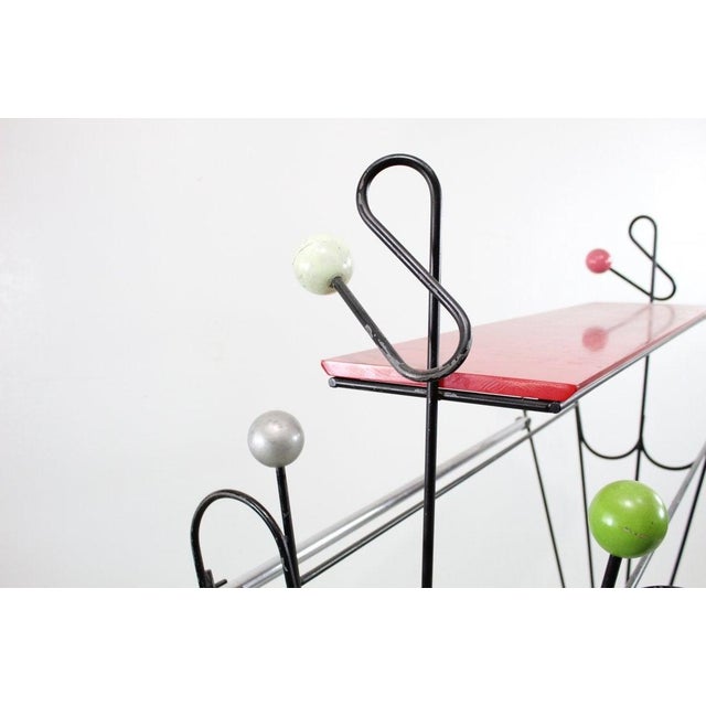 Rare whimsical and monumental Coat Stand attributed to French designer Roger Feraud. Unusual coat stand attributed to the...