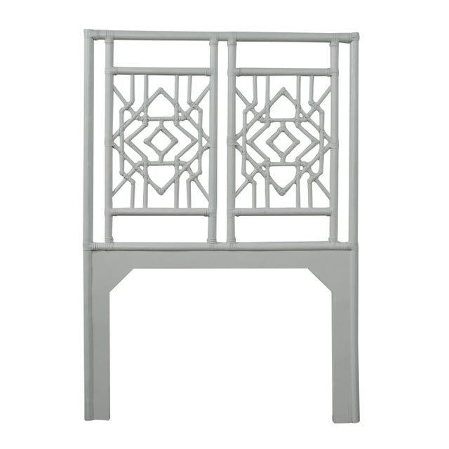 This headboard features classic Rattan design in a geometric pattern. Constructed of solid rattan and hand bound with...