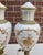 Matching pair of Sevres Porcelain and bronze-mounted table lamps. Gilt-bronze and hand-painted bodies on a pure white...