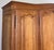 Vintage Louis XVI French Four Door Oak Carved Armoire For Sale - Image 4 of 12