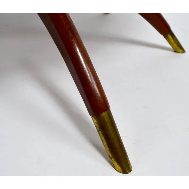 Interesting brass tray top table with folding mahogany spider leg base. Probably Moroccan in origin, circa 1950s or 1960s.