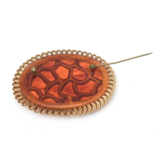 Brass Art Deco Orange Amber Brown Bakelite and Looped Brass Carved Oval Pin Brooch For Sale - Image 8 of 8