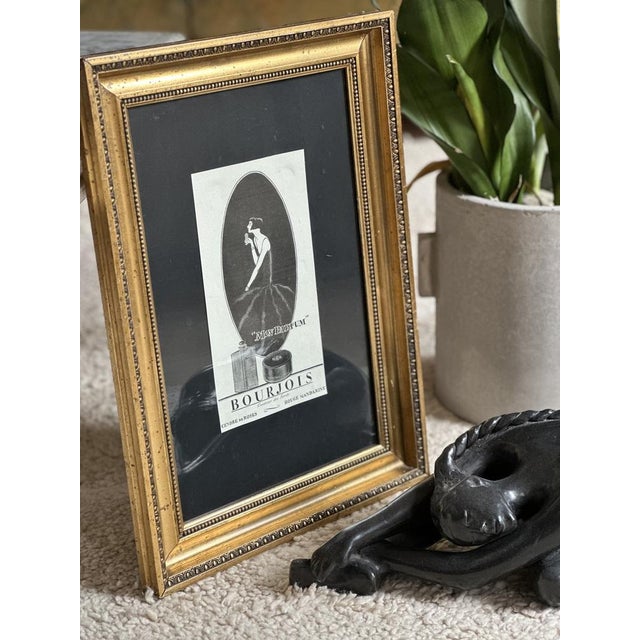 This original offset print hails from a 1920s magazine, showcasing an exquisite advertisement by the renowned cosmetic...