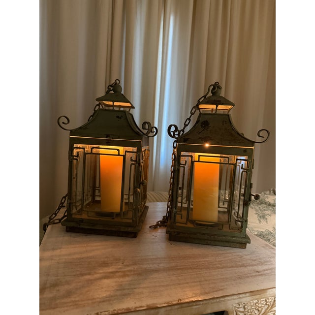 Weathered (see rust on bottom of one lantern-can use a stop rust spray, I have not added anything to lanterns-just cleaned...