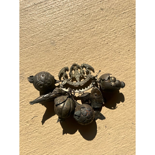 Antique penca de balangandan, an Afro-Brazilian amulet that beautifully intertwines cultural heritage and personal...