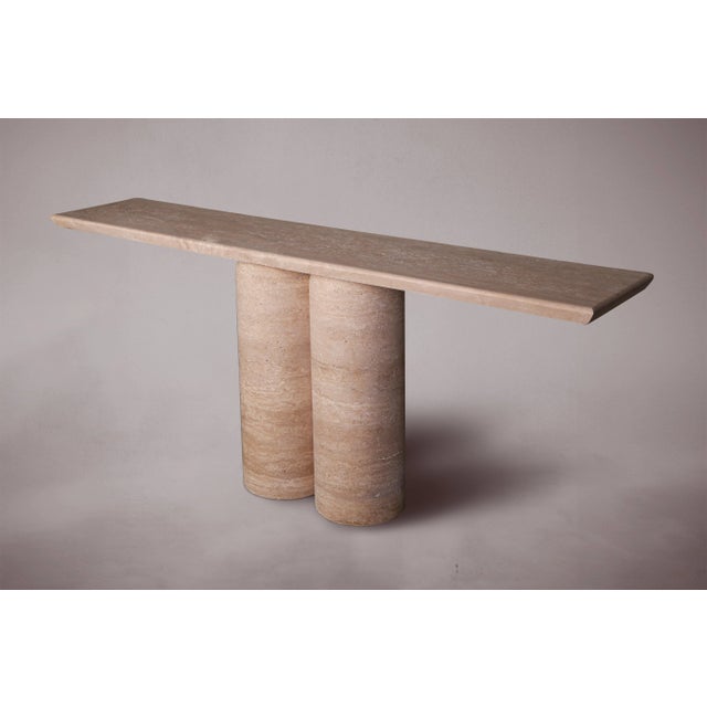 Add a touch of modern elegance to your living space with our exquisite Bullet Leg Console Table. Featuring two bullet-...