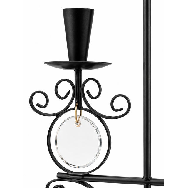Vintage Swedish candle holder designed by Harry N. Boström for the brand Bo Svensk. It is crafted from black wrought iron...