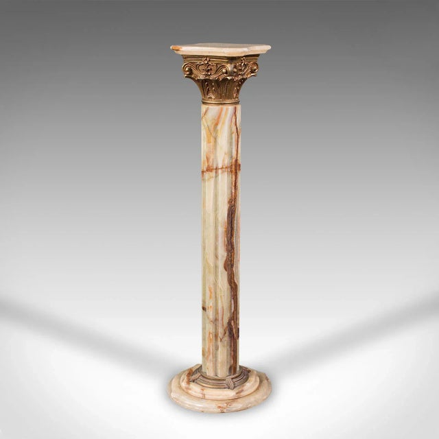 This is a vintage decorative jardiniere stand. An Italian, green onyx planter pedestal, dating to the mid 20th century,...