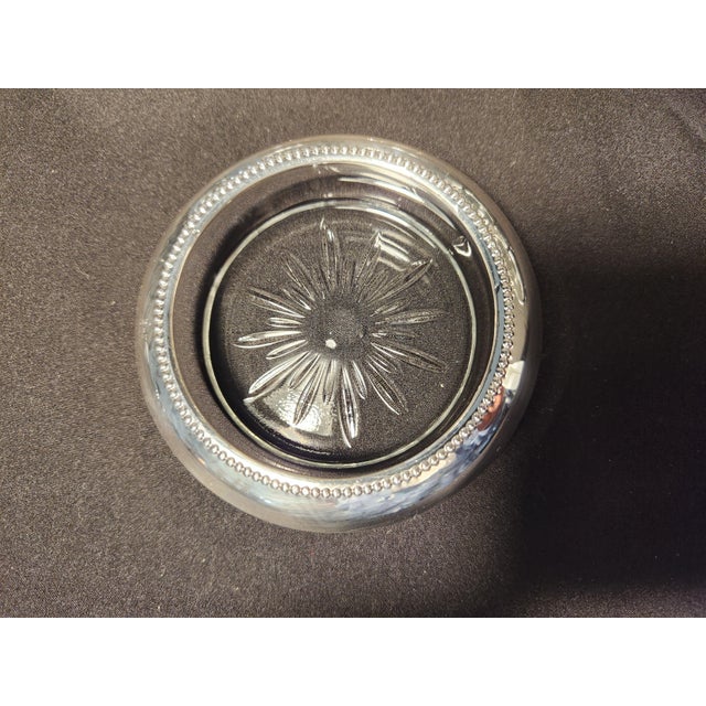 Elevate your next gathering with this stunning set of eight vintage mid-century sterling silver and cut-crystal coasters...