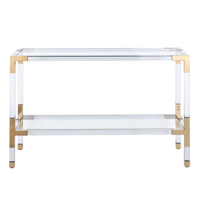The Lucen Console features a lucite frame with gold-plated stainless steel accents. Its top provides an elegant stage for...
