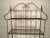 Tall metal kitchen rack, newly stripped and restored in a bare metal style finish. Features four metal shelves and space...
