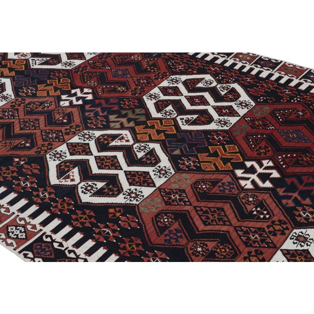 Flat-Woven In Turkey Originating Between 1950-1960, This Vintage Midcentury Geometric Kilim Hails From The City Of...