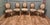 French Salon chairs circa 1880 in the Louis XVI style, 4 single and one carver chair The chairs have aged gold carved Gilt...
