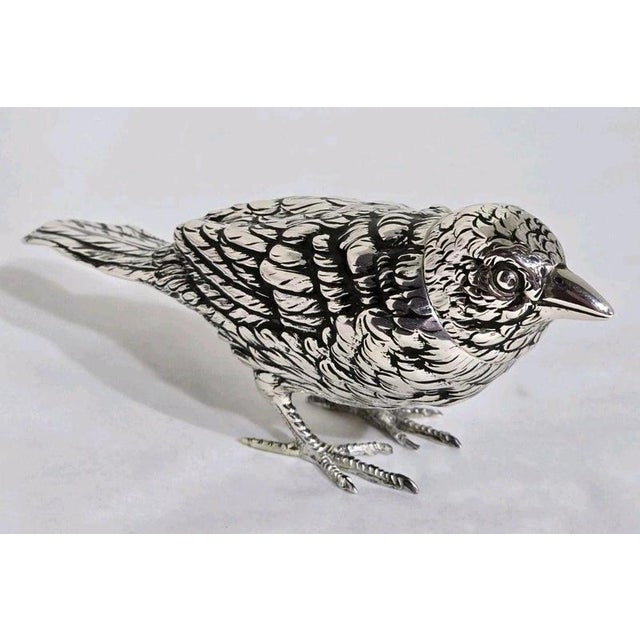 A charming early 20th-century Continental solid silver novelty model, naturalistically fashioned as a bird. The detachable...