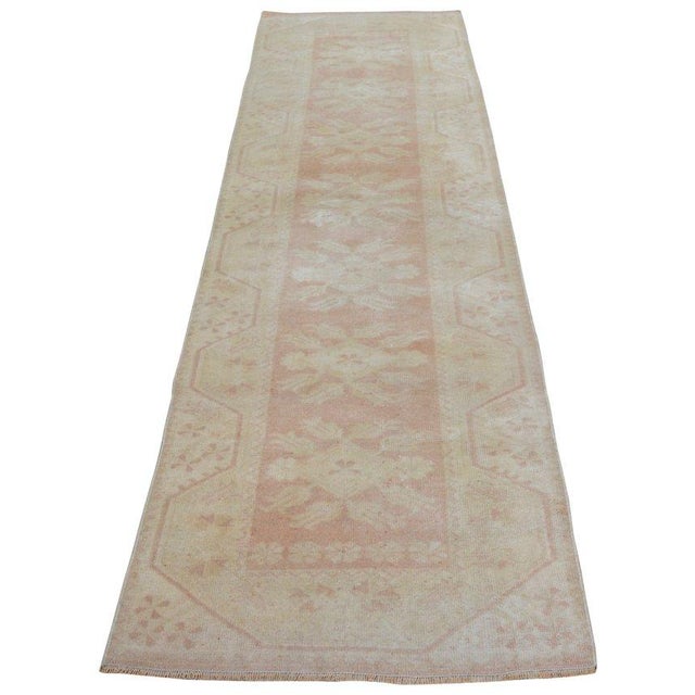 Hand-knotted with care using traditional rug-making techniques, this wool rug blends timeless craftsmanship with a modern...