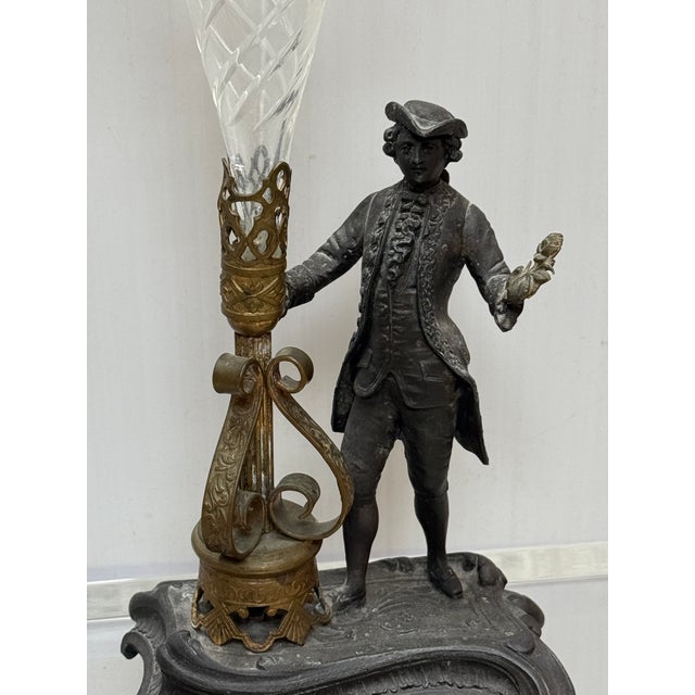 Design Plus Gallery presents the Antique Rococo Revival Figural Spelter and Etched Glass Trumpet Vase. The sculptural...