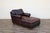 A handsome vintage chaise lounge by Old Hickory Tannery, upholstered in rich brown leather with a beautifully aged patina....