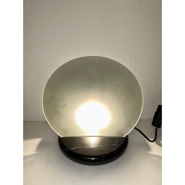 Table or floor lamp, "Gong" model with marble base, aluminum part, and glass plate by Bruno Gecchelin. Produced in the...