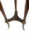 An elegant French Louis XVI Revival pedestal table, dating to the late 19th century, crafted in richly figured mahogany...