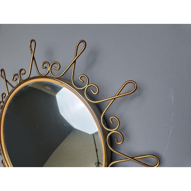 Mid century brass sunburst or flower mirror with convex glass. This mirror fits in most interiors and is a perfect add-on...