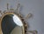 Mid century brass sunburst or flower mirror with convex glass. This mirror fits in most interiors and is a perfect add-on...