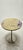 Carlo Malnati painterly wood table in a matte metallic gold. A rainbow of colors produce a beautiful abstract design. It...