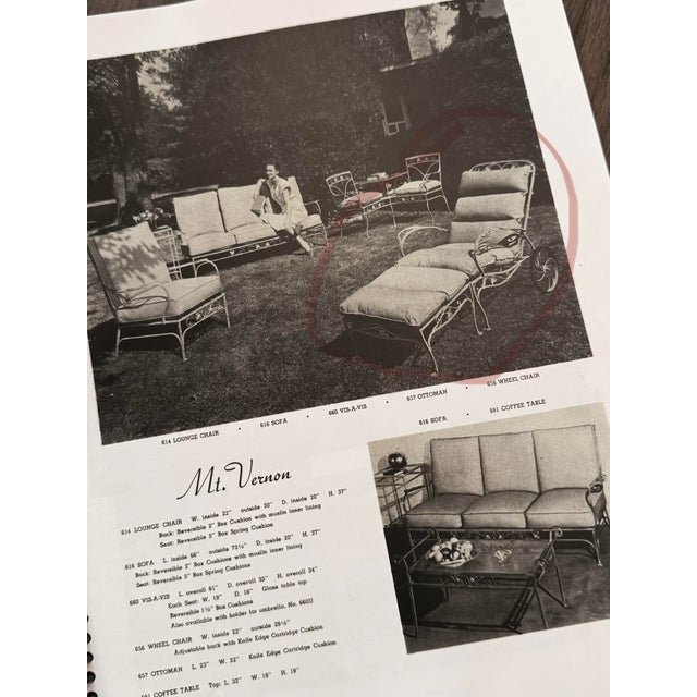 This rare mid-20th century Salterini “Mt. Vernon” collection wrought iron wheel chair chaise lounge with coordinating...