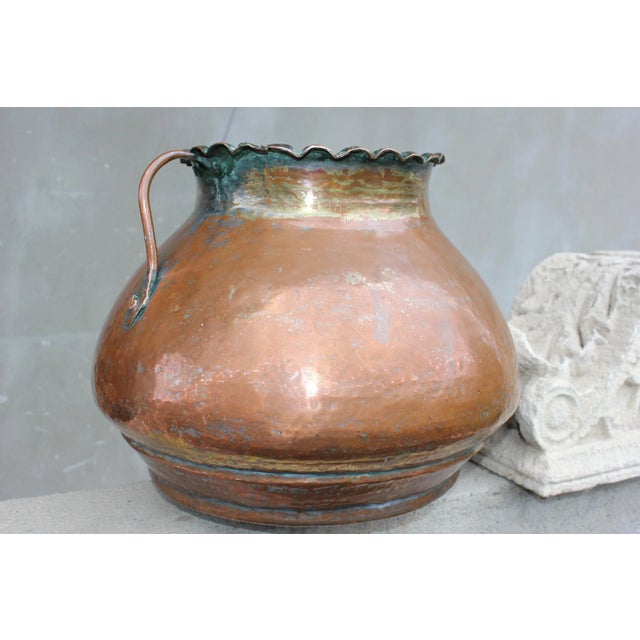 Beautiful 19th century handmade copper cauldron. This cauldron is made of several pieces of copper that have been joined...