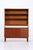 Vintage teak shelving unit in classic Danish design. The upper section offers ample open storage space, while below are...