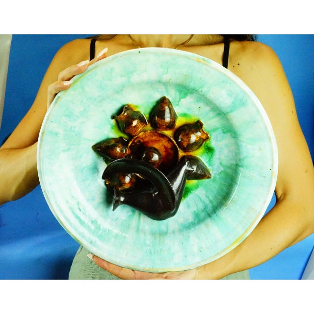 Measurements: height: 34 cm; width: 33.5 cm; depth: 8.5 cm; weight: 2.385 kg a refined, heavy majolica display plate,...