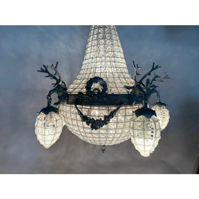 A rare matching pair of 1980s French Louis XVI-style chandeliers in solid bronze with a dramatic charcoal patina. Each...