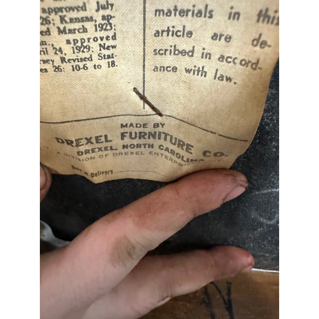 Transform your living space into a sanctuary of style with the MCM Danish Style Wood and Cane Chair by Drexel. Impeccably...