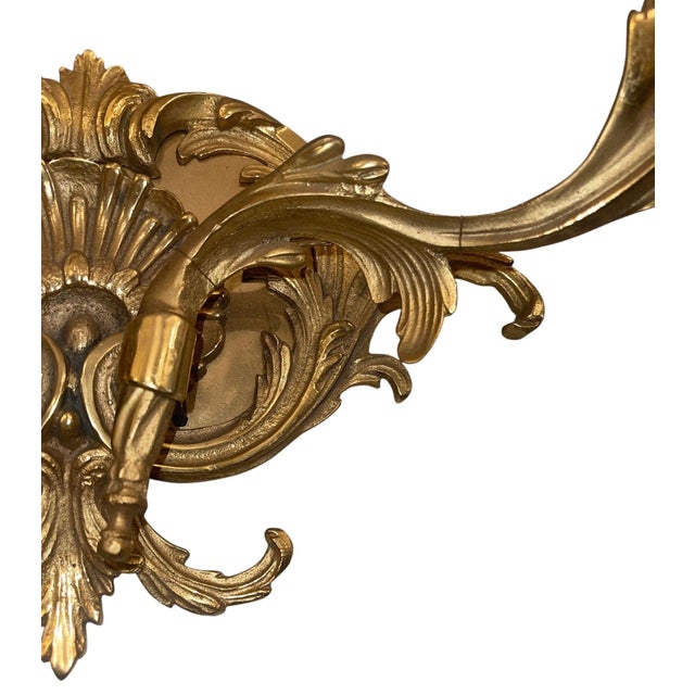 Metal Mid 20th Century Pair of French Gilt Bronze Louis XV Style Two-Light Wall Sconces For Sale - Image 7 of 9