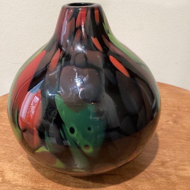 This exquisite Murano style vase is a true piece of art glass. Hand blown in Italy during the mid-century modern era, it...