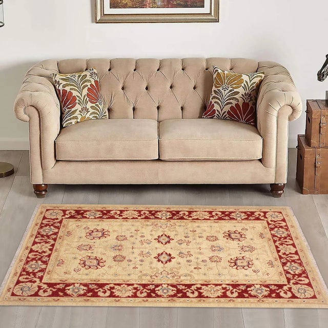 "Enhance the ambiance of your home with this magnificent Persian-influenced Turkish hand-knotted rug made by skilled...