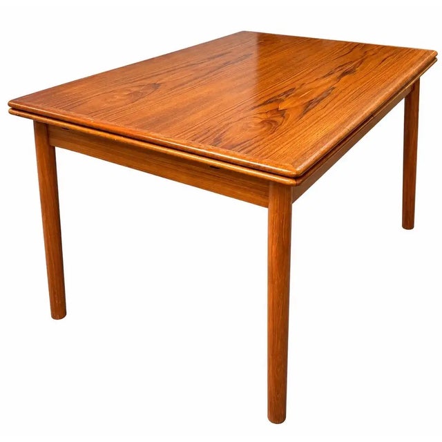 Danish MCM Teak Dining Room Table with Two Pull-Out Extension Leaves , 1960's This beautiful vintage Danish Mid-Century...