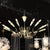 This Mid-Century Modernist twelve-light chandelier by Stilnovo, crafted in Italy circa 1960, is a striking example of the...