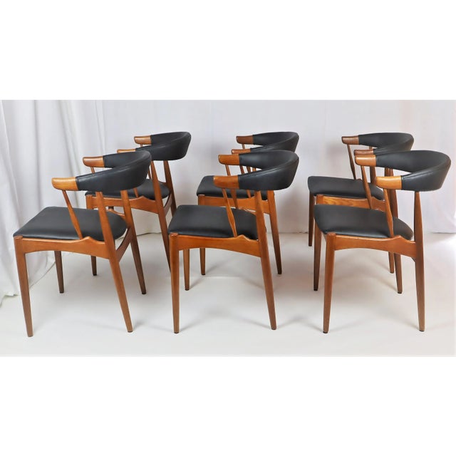6 Danish teak chairs by Johannes Andersen, edited by Samcom- Denmark 1960. Structure in solid teak. Black imitation...