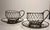 Charming vintage wire folk art set of tea cups for decor.