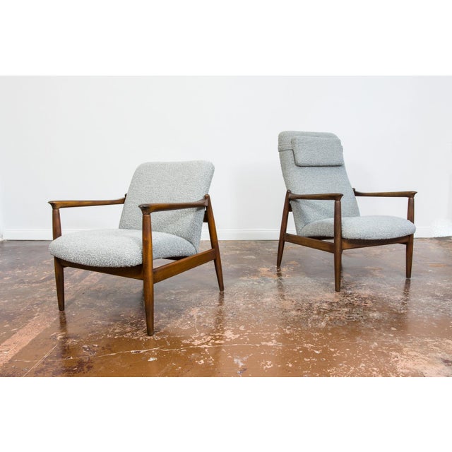 A pair of GFM-64 and GFM-64 armchairs in a high-back version, designed by Edmund Homa, manufactured in the Gościcińska...