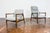 A pair of GFM-64 and GFM-64 armchairs in a high-back version, designed by Edmund Homa, manufactured in the Gościcińska...