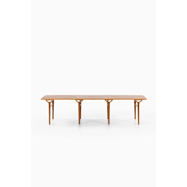 Rare library table designed by peter white & orla mølgaard-nielsen. Produced by fritz hansen in denmark. This piece is...