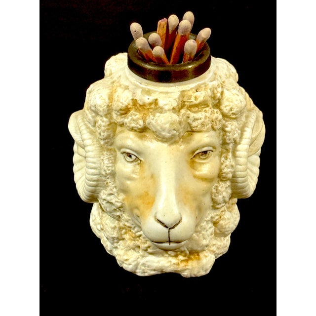 Rare German Porcelain Ram Head Matchstrike, c.1900, Attributed Schafer & Vater A rare and highly characterful German...