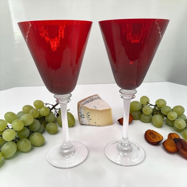 Add a touch of elegance to your next dinner party or holiday gathering with this beautiful set of two ruby red wine...
