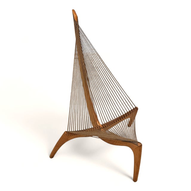 A rare opportunity to acquire a pristine, matched pair of the iconic "Harp" Chair, designed by Jørgen Høvelskov in 1963....