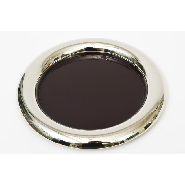 This wonderful 1970's vintage Italian round tray is nickel silver and brown enamel interior. It is hallmarked on the...